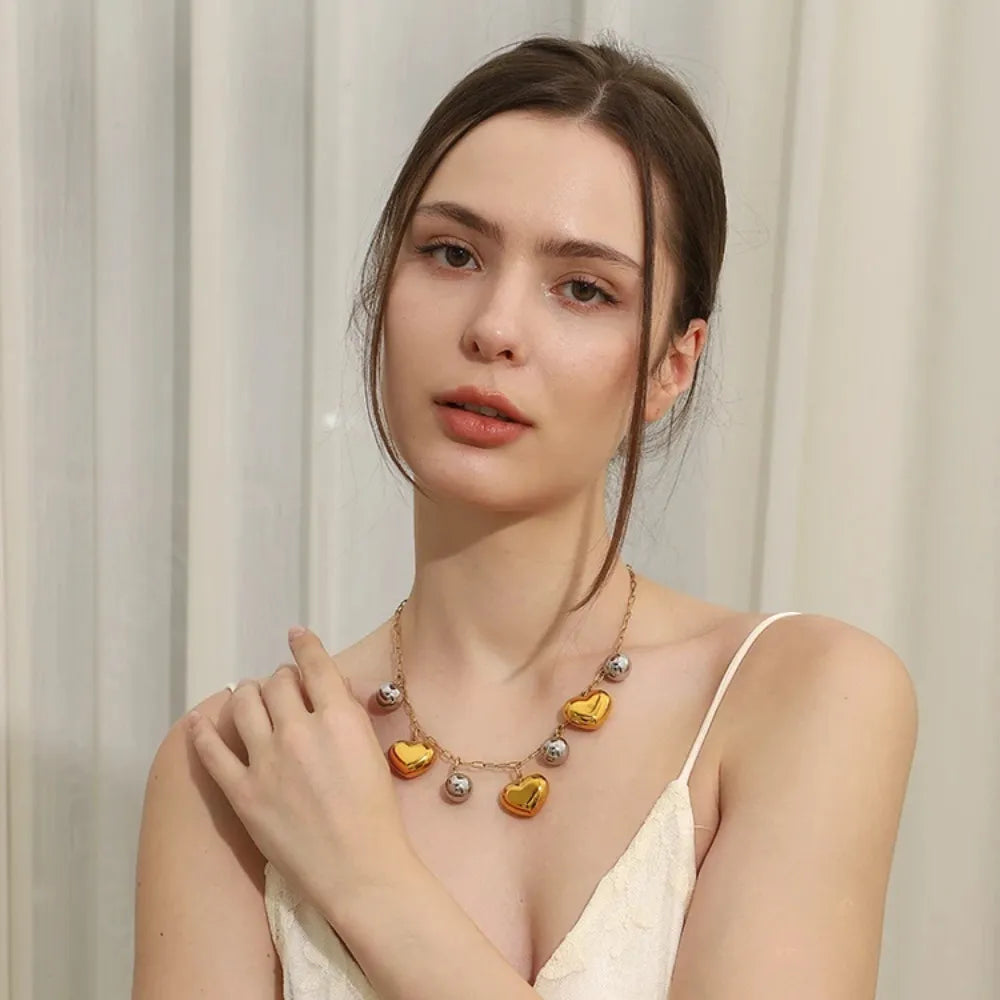 Colar Charme Coração Duplo Banhado a Ouro 18K