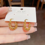 Brincos de Argola Luxo Torcido Banhado a Ouro 14k