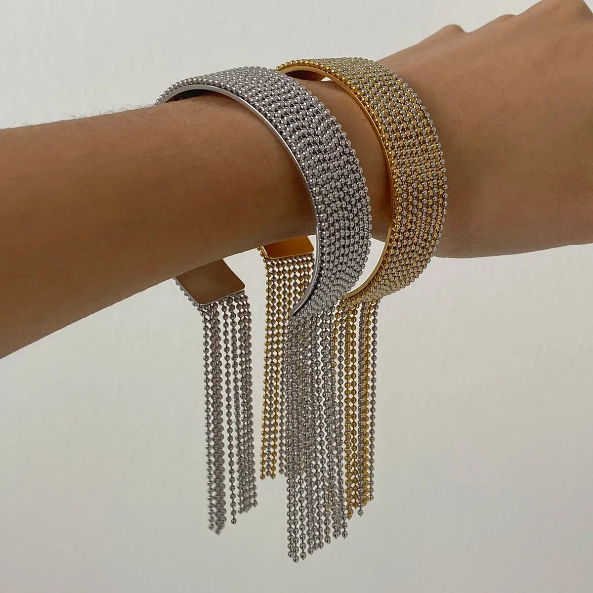 Pulseira Manguito Luxuosa com Borla em Ouro e Prata