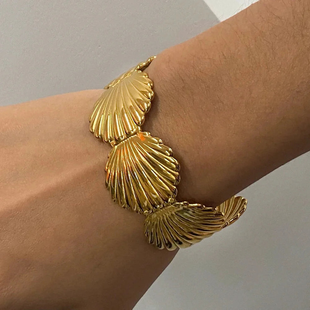 Pulseira Concha Dourada Uworld - Elegância Oceânica